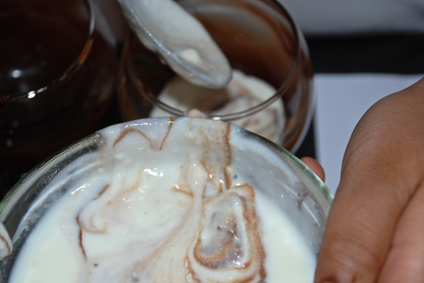 The Mess while pouring the yoghurt into the chocolatey sundae bowl The Mess while pouring the yoghurt into the chocolatey sundae bowl