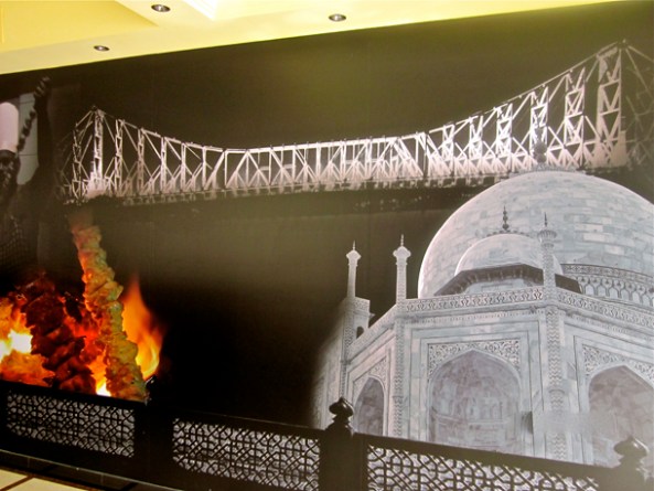 The huge wall decor which fuses both Kolkata & Lucknowy nostalgia