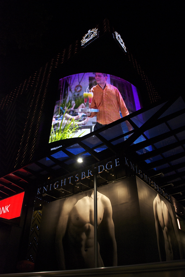 The huge advertisements in wall LEDs; Below- American fashion retailer Abercrombie & Fitch's advertisement - It opened a flagship store on Orchard Road on December 15, 2011. The store was marked by tremendous controversy over this ad during its construction phase! 