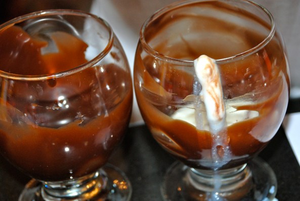 The Mess while pouring the yoghurt into the chocolatey sundae bowl The Mess while pouring the yoghurt into the chocolatey sundae bowl