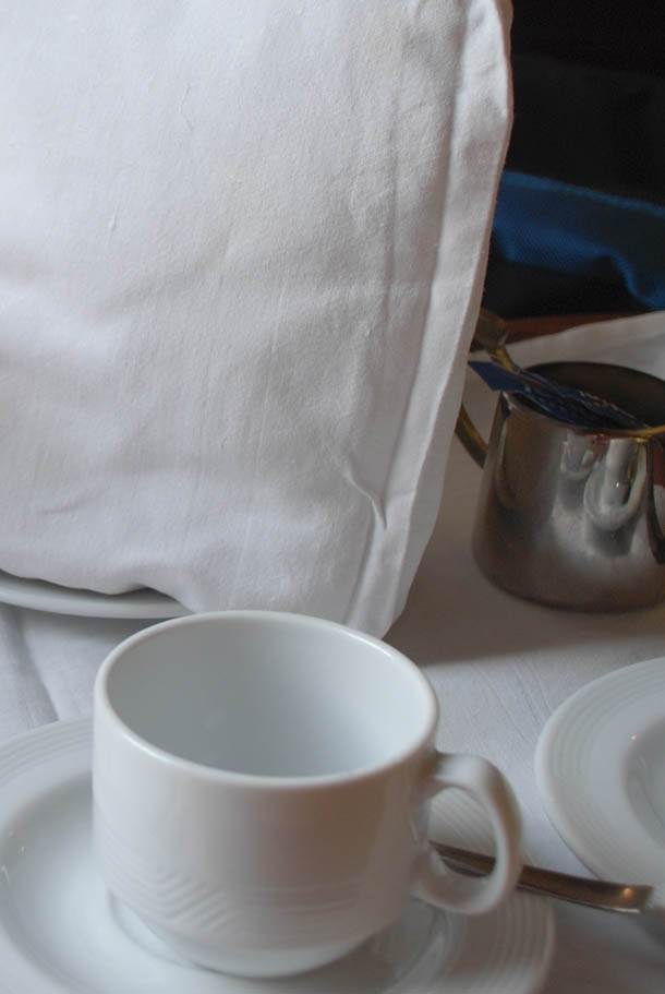 The white cup calling out to the hot tea!