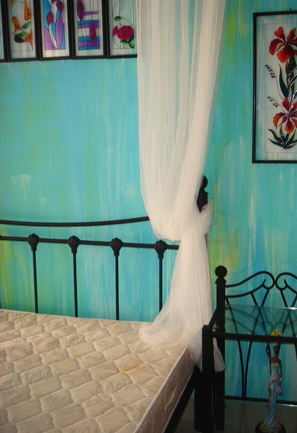 The hard orthopaedic mattress in the Guest Room