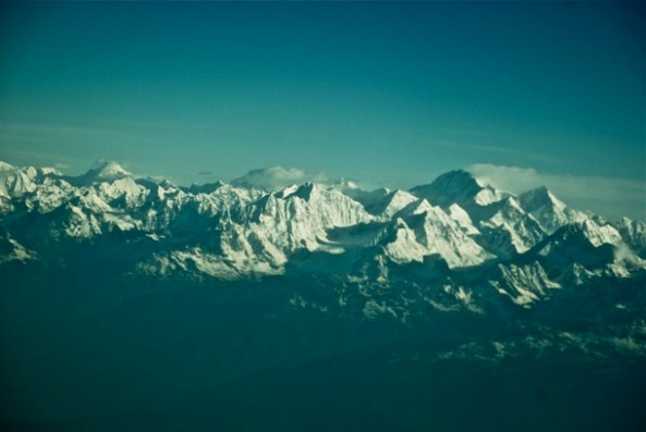 The numerous peaks and summits of the Himalaya, bathed in the warm rays of the morning sun The numerous peaks and summits of the Himalaya, bathed in the warm rays of the morning sun