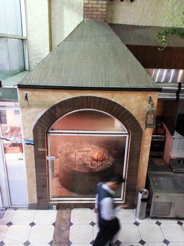 The special glass room where the fish is being smoked