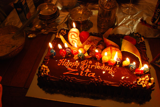 The cake cutting for the home party.