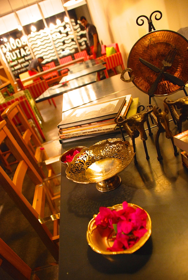 Table decoration with personal silver bowls, folk artefacts from Bengal