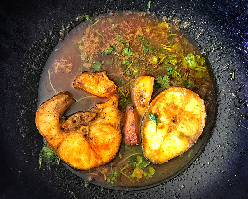 Aar match prepared in a light gravy with turmeric and cumin