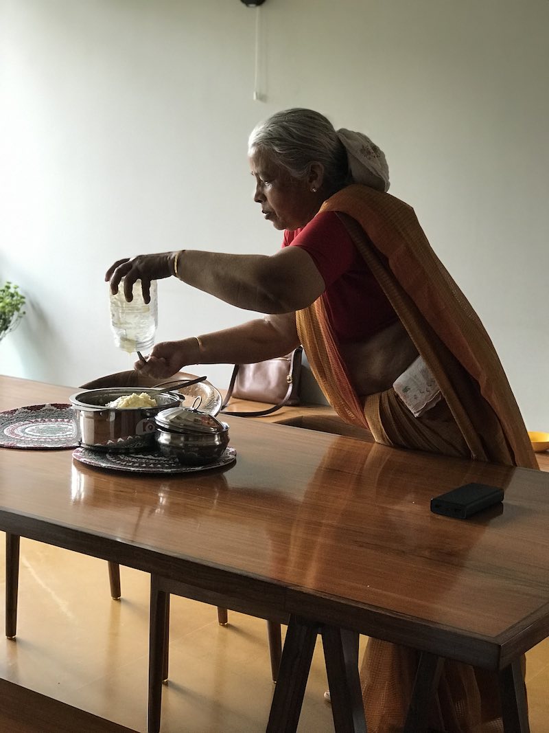 Aunty setting up the table