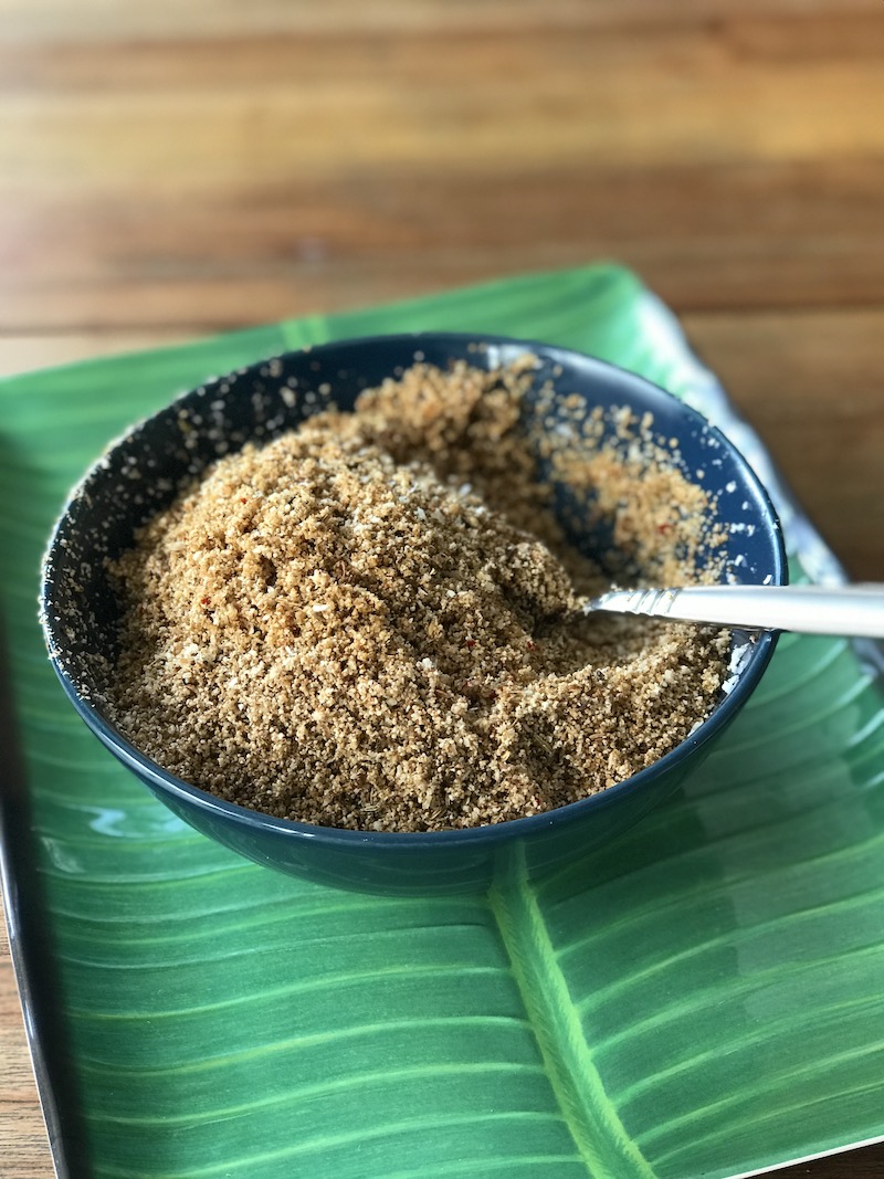 Grinding dry roasted spices for making Chettinad masala
