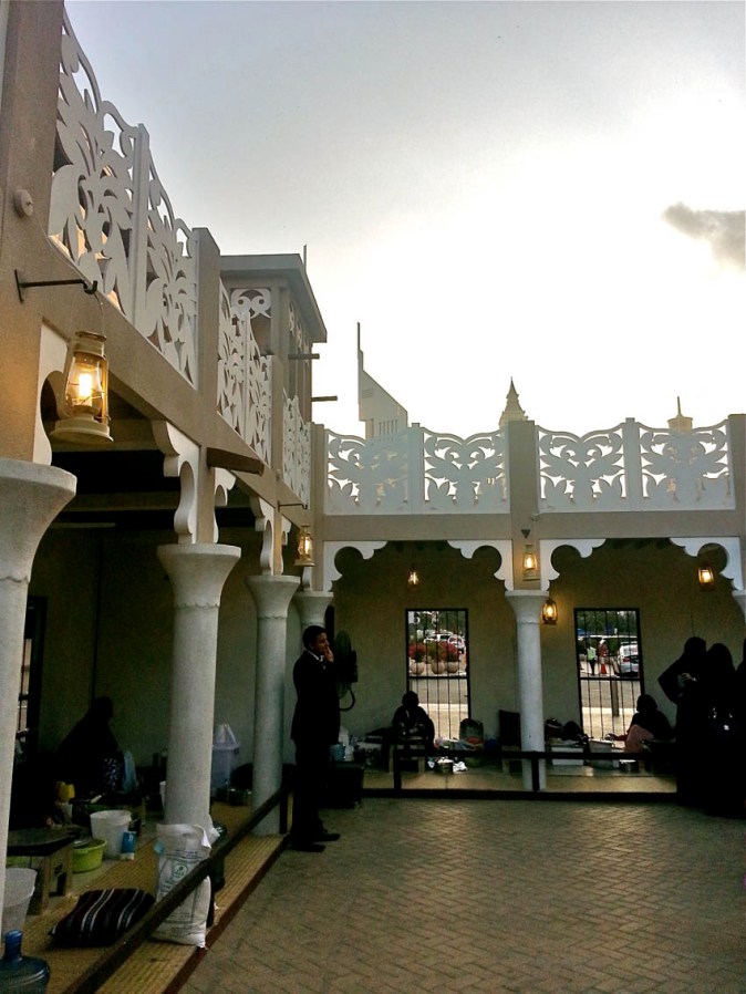 DWHC - Local womenfolk cooking in the balcony that surrounds the courtyard