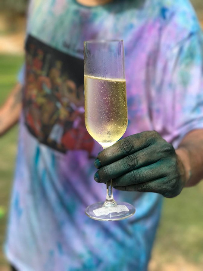 Bubbly in a coloured hand