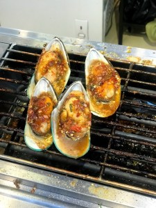 Grilled mussels in Floating Market in Global Village