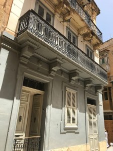 Filigreed verandas of traditional buildings in Birgu